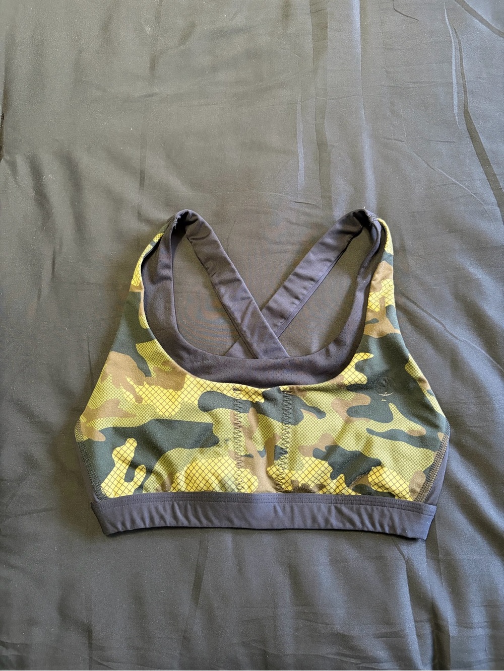 Zumba wear camo sports bra. Size M seems more like a small.
